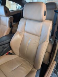 Remplacement du bandeau latéral gauche d'accès à bord sur dossier conducteur par RC Sellerie RC Sellerie